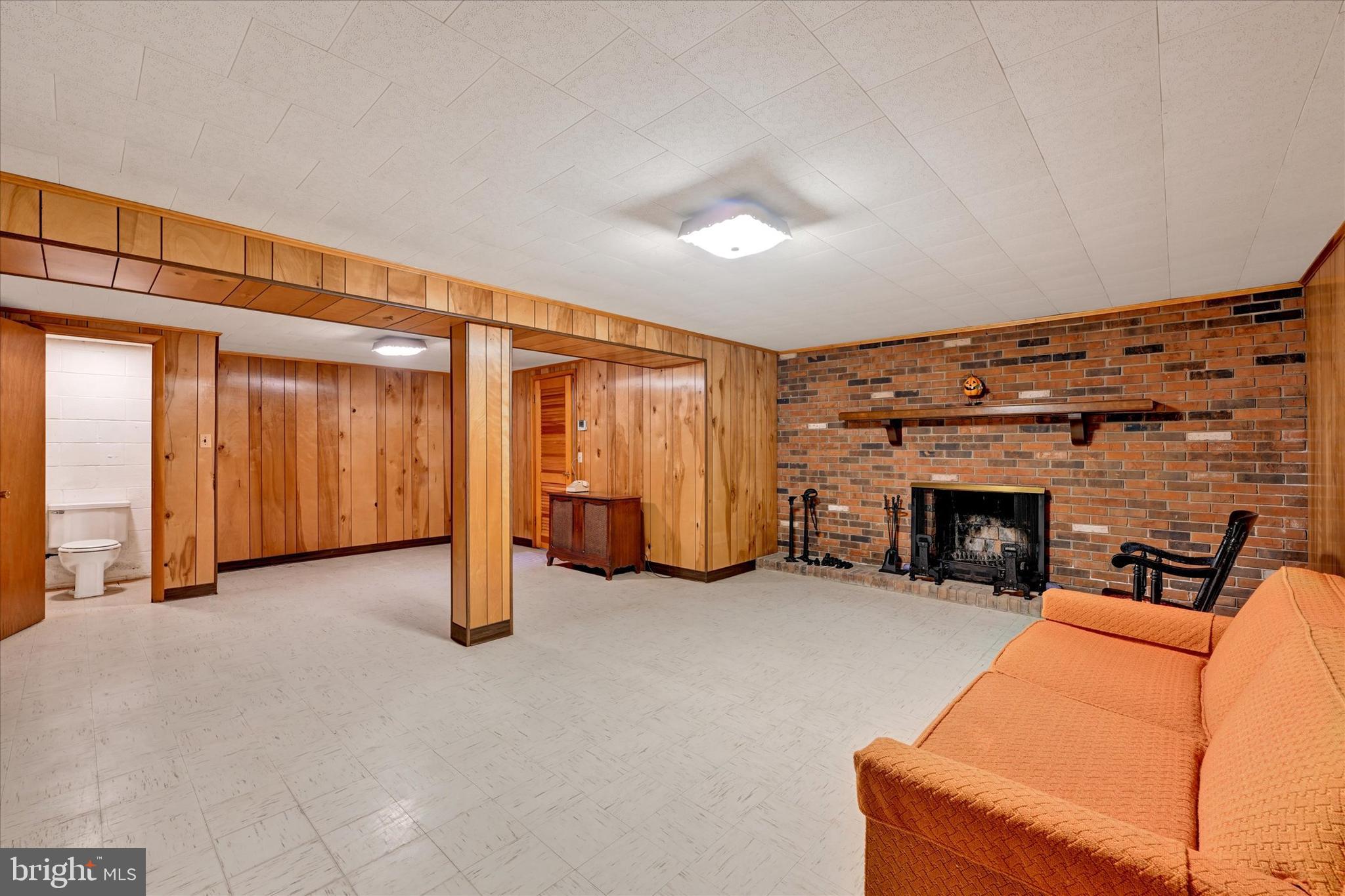 1320 Seling Avenue Rosedale, MD 21237 - Photo 19 of 26 Lower Level Family Rm with Wood Burning Fireplace
