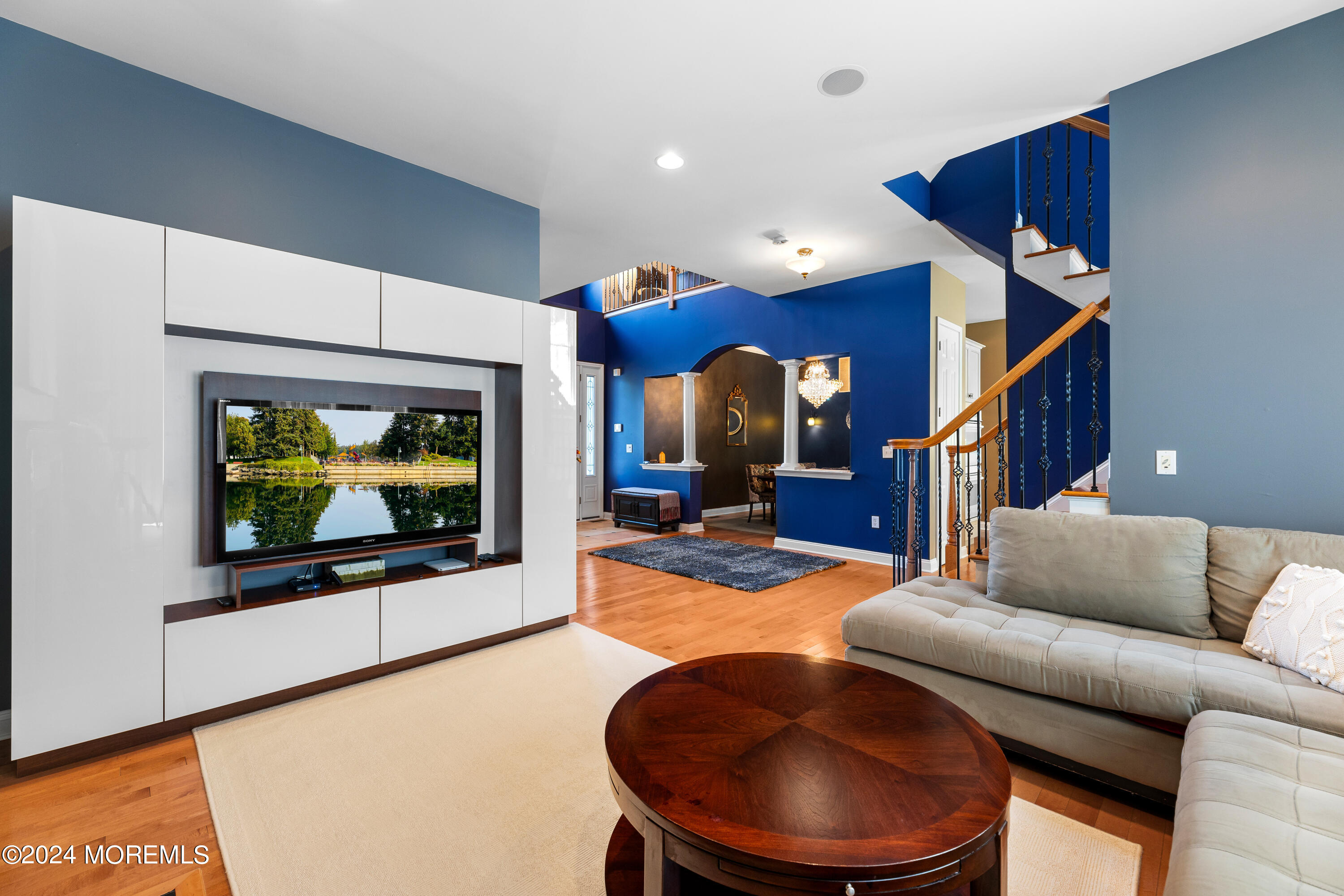 19 Rockspray Court Howell, NJ 07731 - Photo 11 of 37 a living room with furniture and a flat screen tv