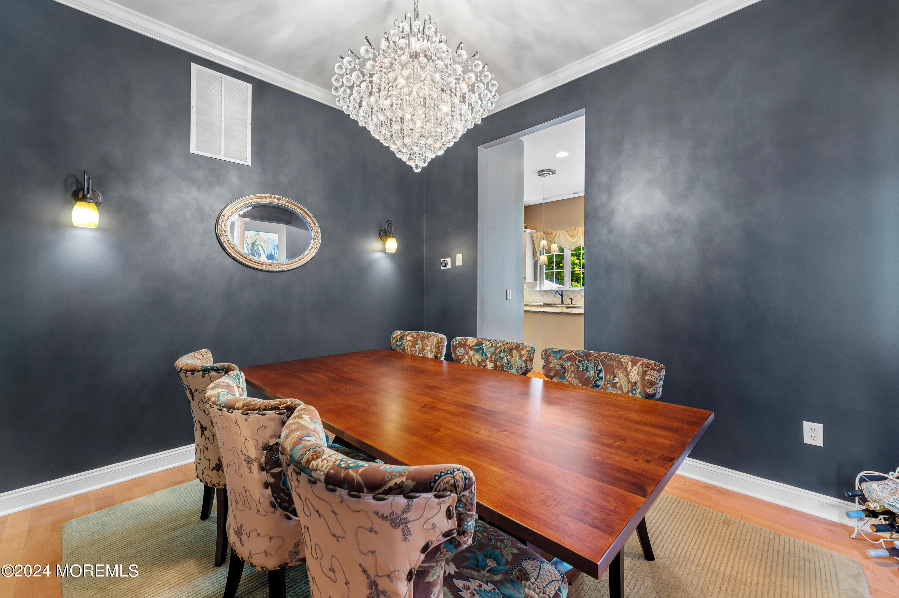 19 Rockspray Court Howell, NJ 07731 - Photo 13 of 37 a dining room with a table and chairs
