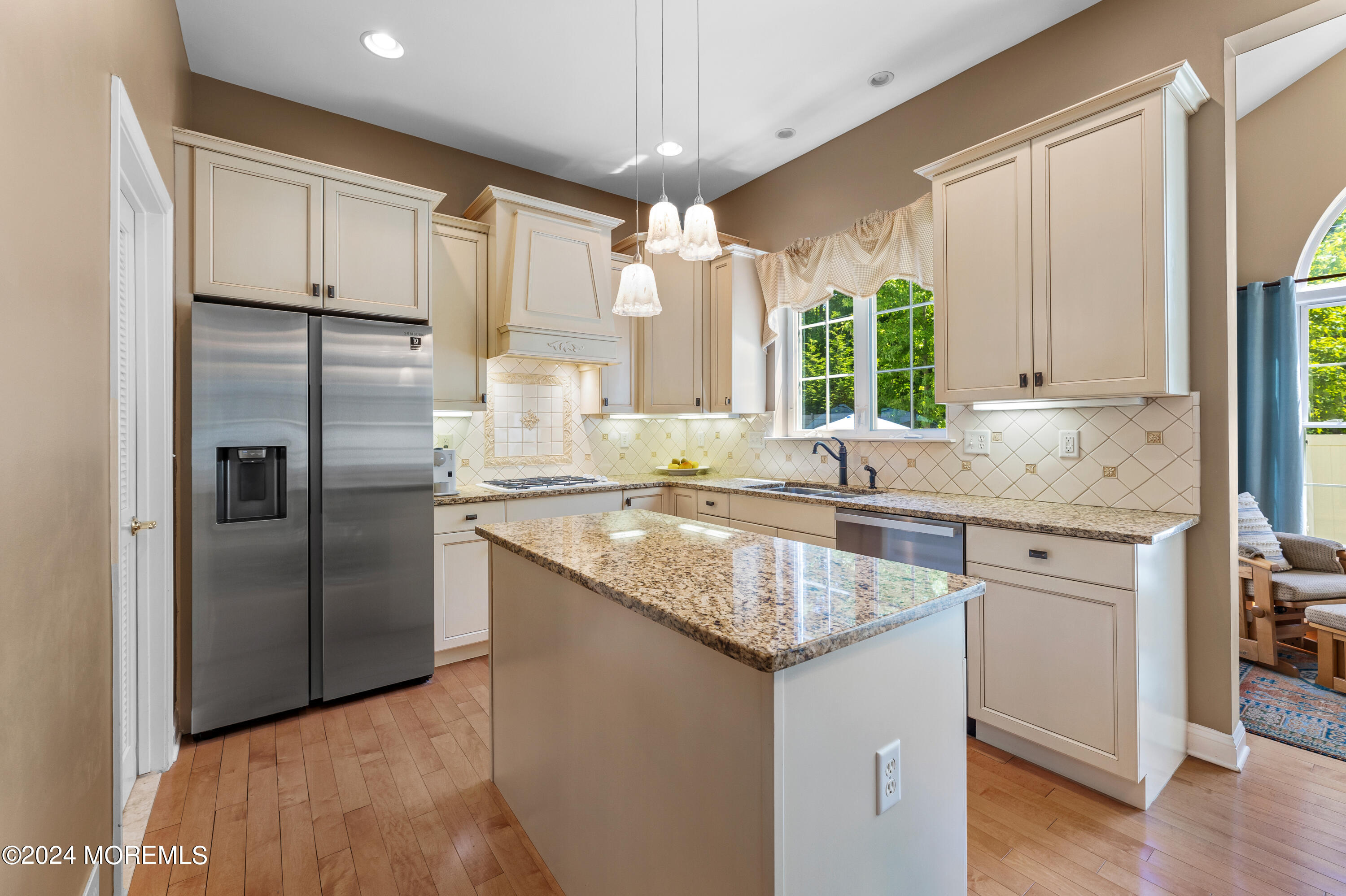 19 Rockspray Court Howell, NJ 07731 - Photo 14 of 37 a kitchen with granite countertop a sink and a refrigerator