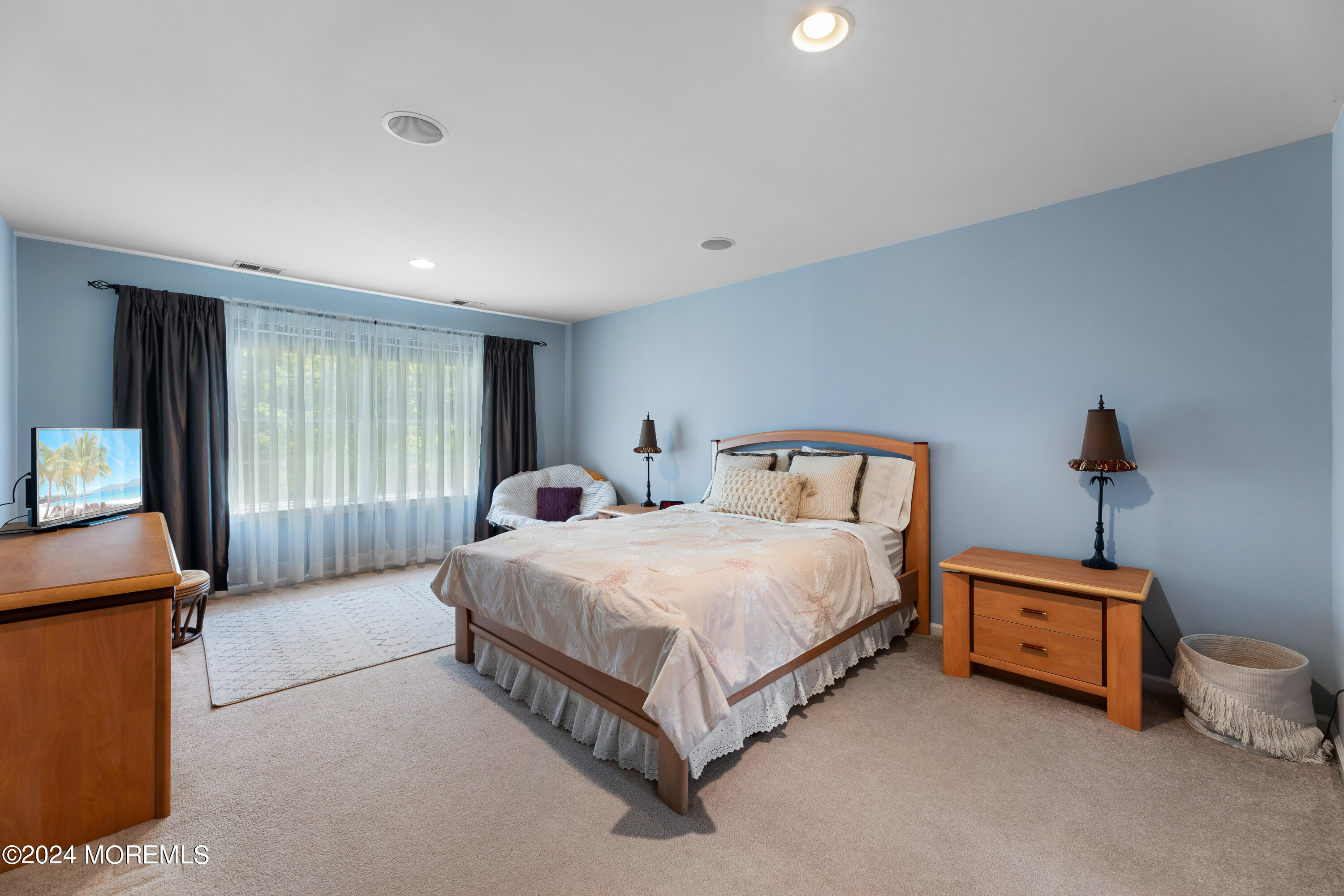 19 Rockspray Court Howell, NJ 07731 - Photo 28 of 37 a bedroom with two beds and a chandelier