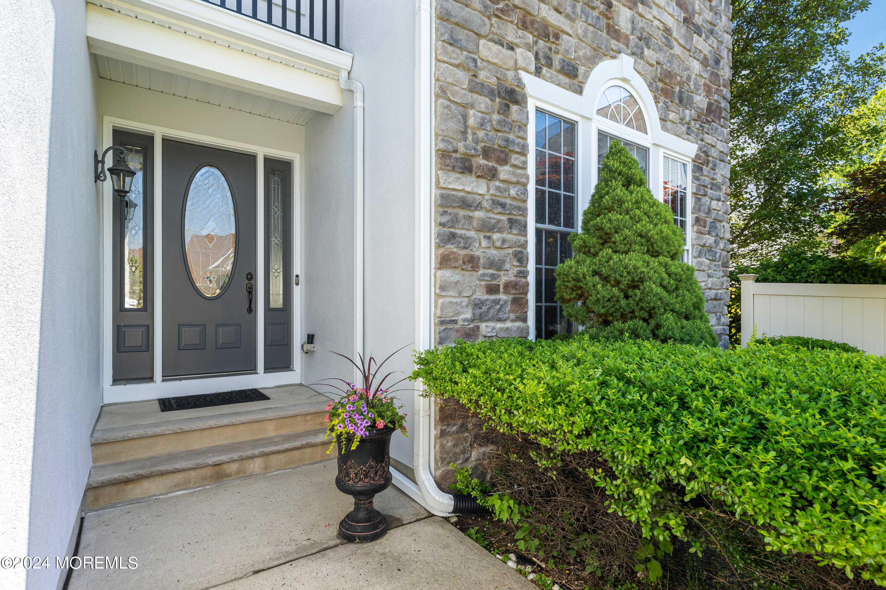 19 Rockspray Court Howell, NJ 07731 - Photo 3 of 37 a front view of a house with a garden