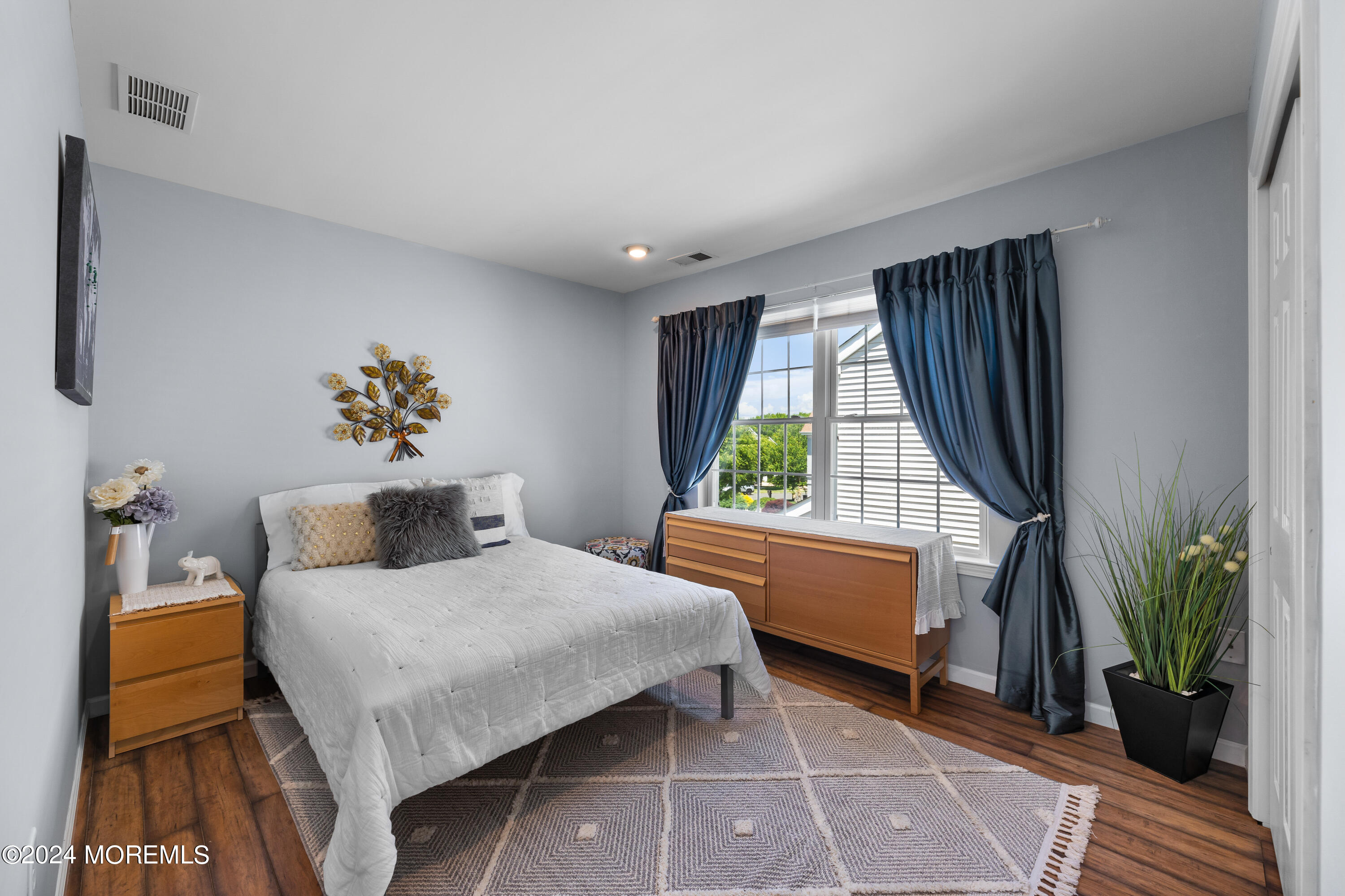 19 Rockspray Court Howell, NJ 07731 - Photo 33 of 37 a bedroom with a bed and a window