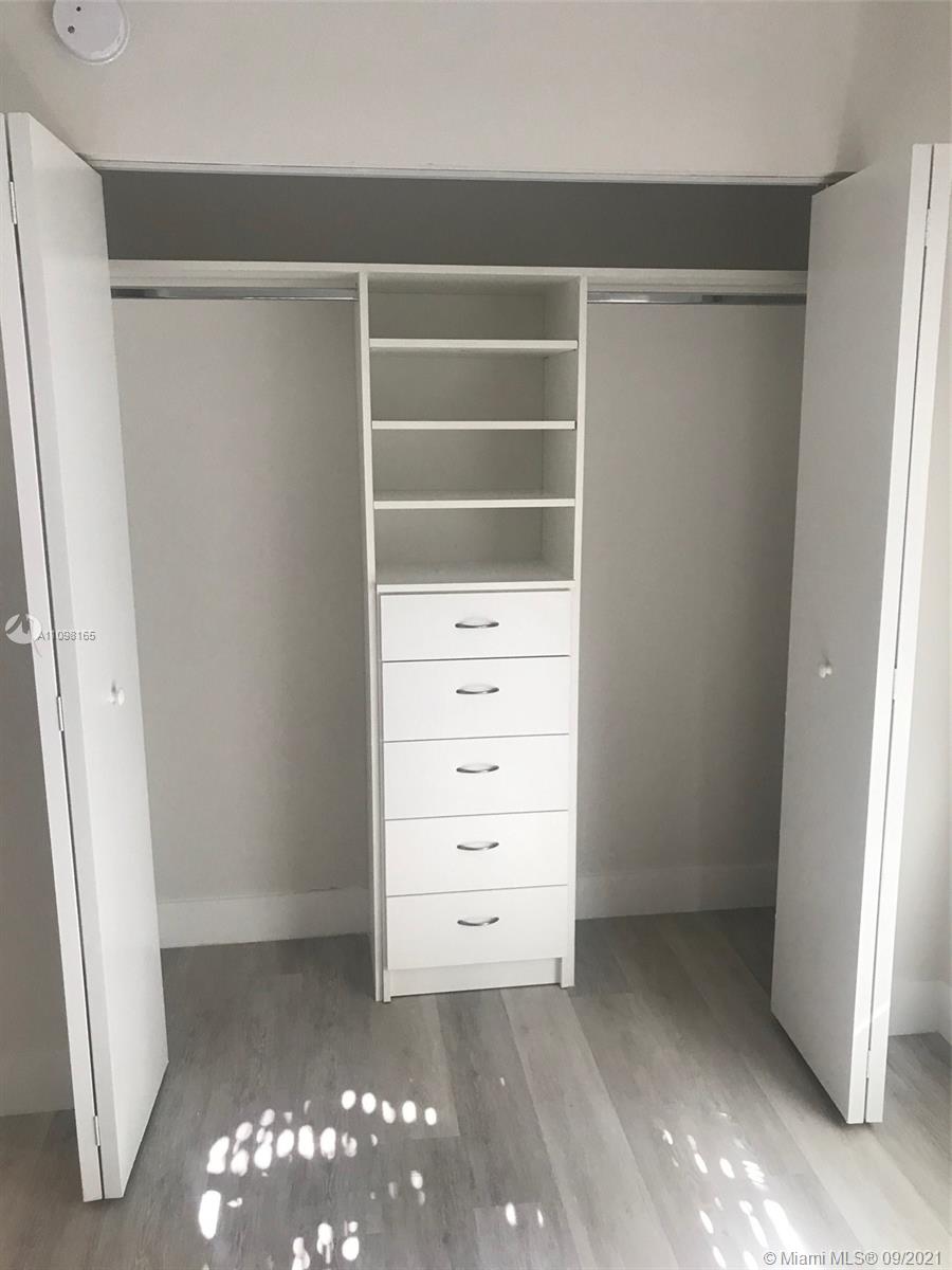 Ojus Miami, FL 33180 - Photo 16 of 17 a view of an empty walk in closet