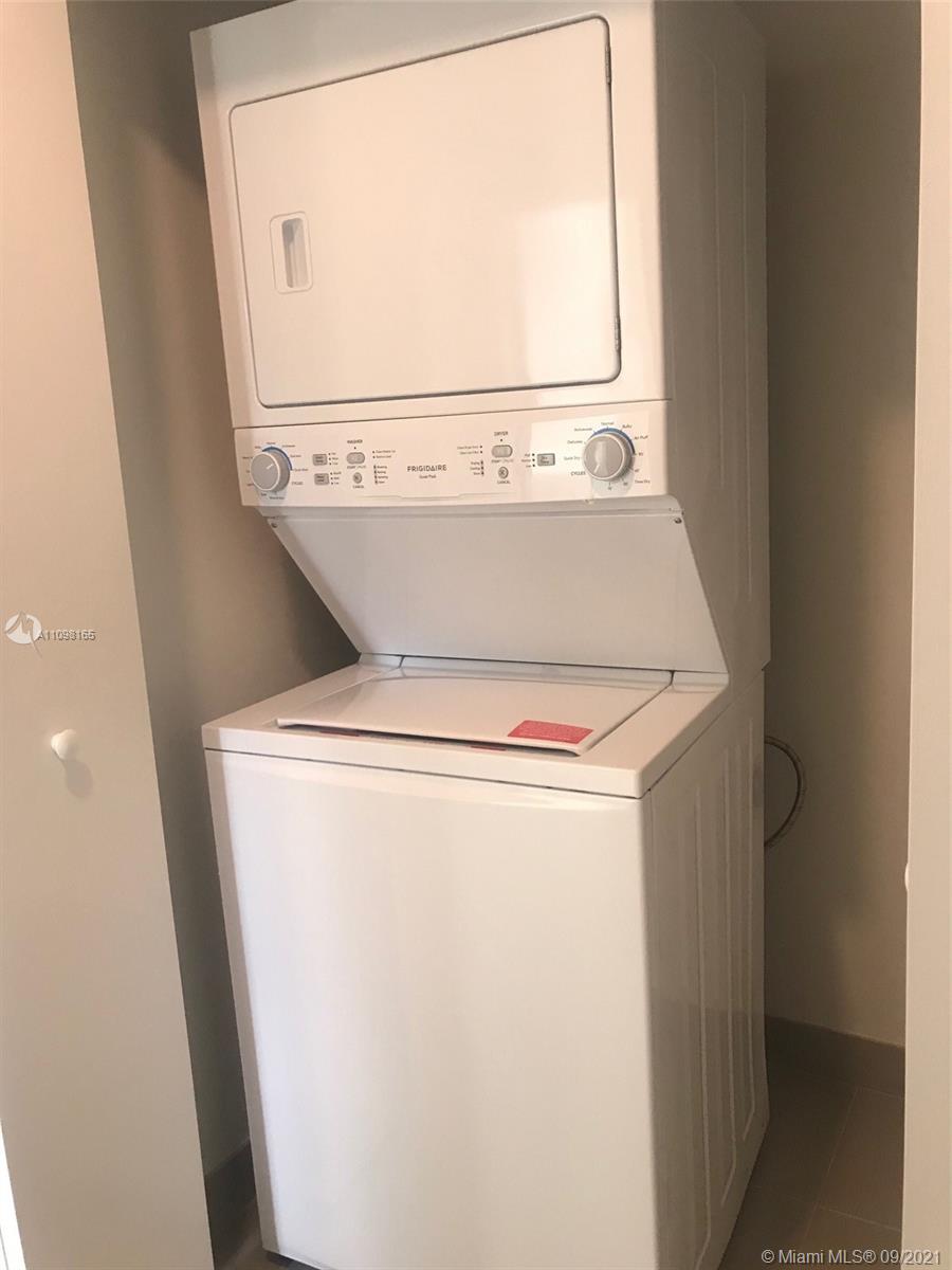 Ojus Miami, FL 33180 - Photo 17 of 17 a utility room with dryer and washer