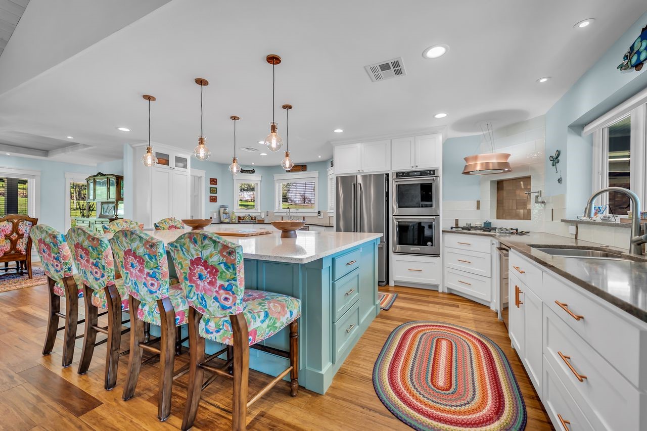 310 Cove Loop Coldspring, TX 77331 - Photo 13 of 48 The owners didn't miss a detail in this kitchen! Double oven, gas stove top with a vented light that was imported from Italy.