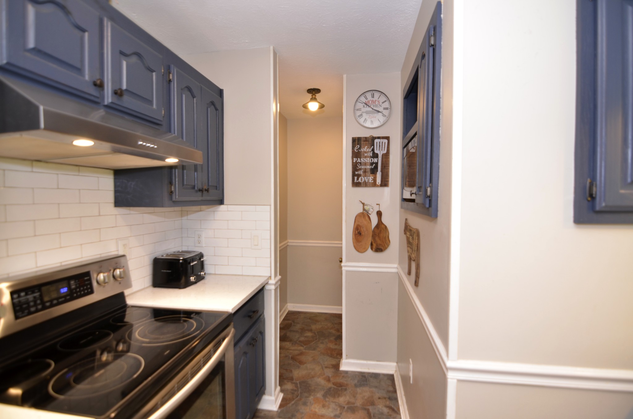 2909 Fly Road Santa Fe, TN 38482 - Photo 19 of 56 a kitchen with a stove and a refrigerator