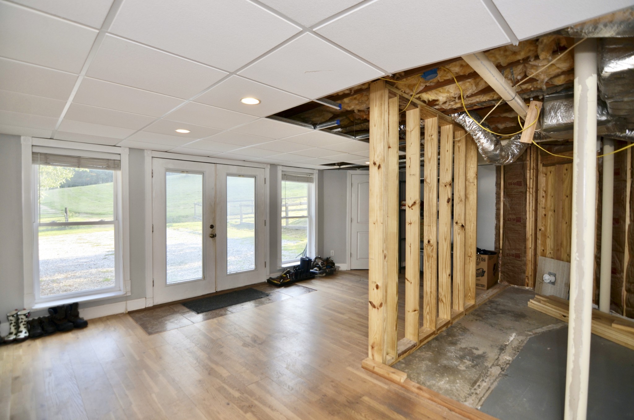 2909 Fly Road Santa Fe, TN 38482 - Photo 30 of 56 a view of an empty room with wooden floor and a window
