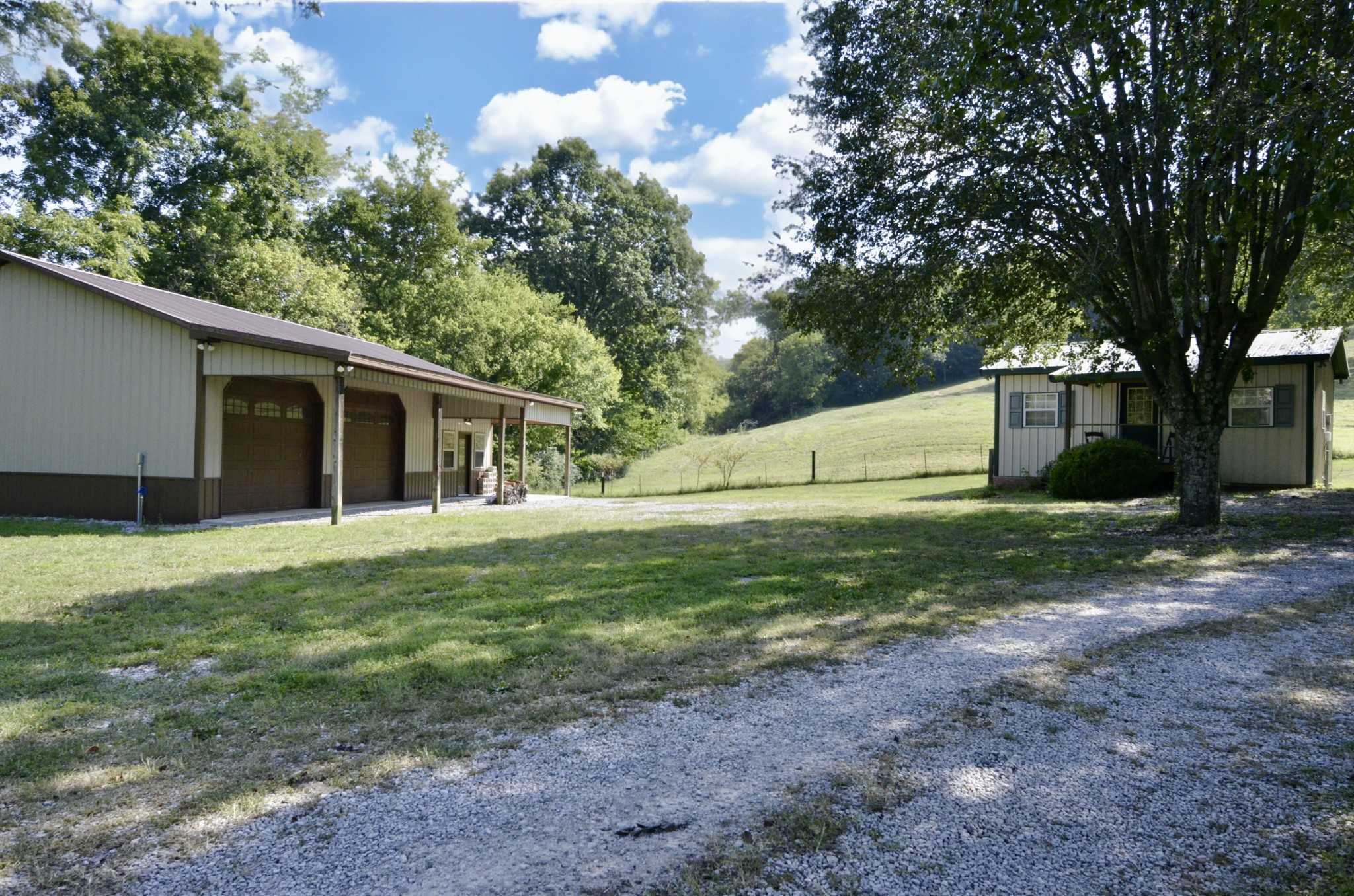 2909 Fly Road Santa Fe, TN 38482 - Photo 48 of 56 a view of a house with yard and a tree