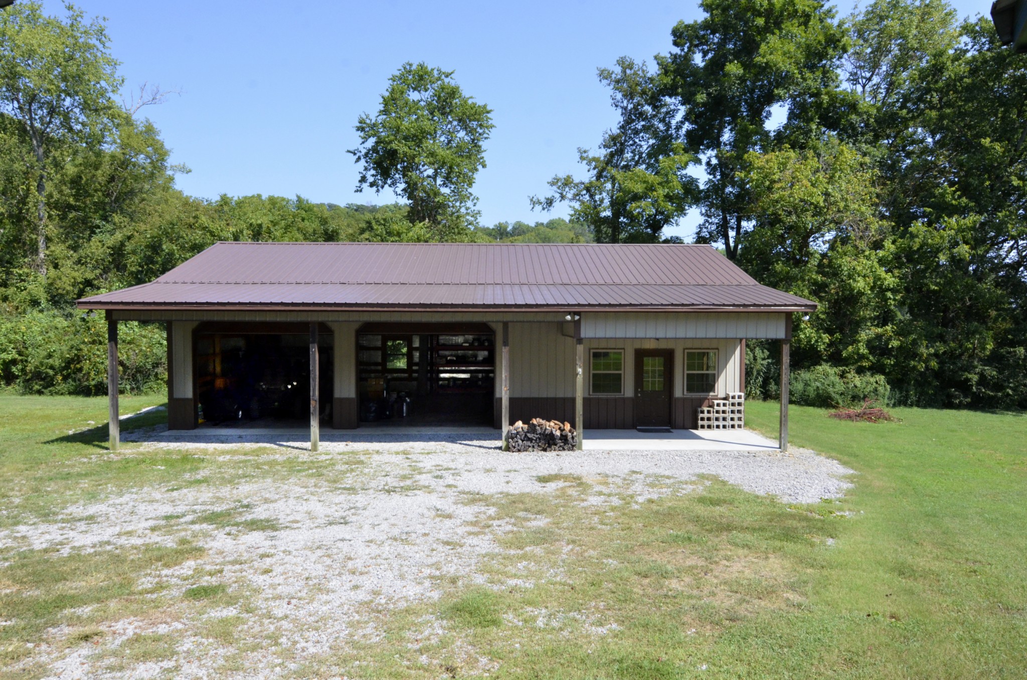 2909 Fly Road Santa Fe, TN 38482 - Photo 54 of 56 a front view of a house with a porch