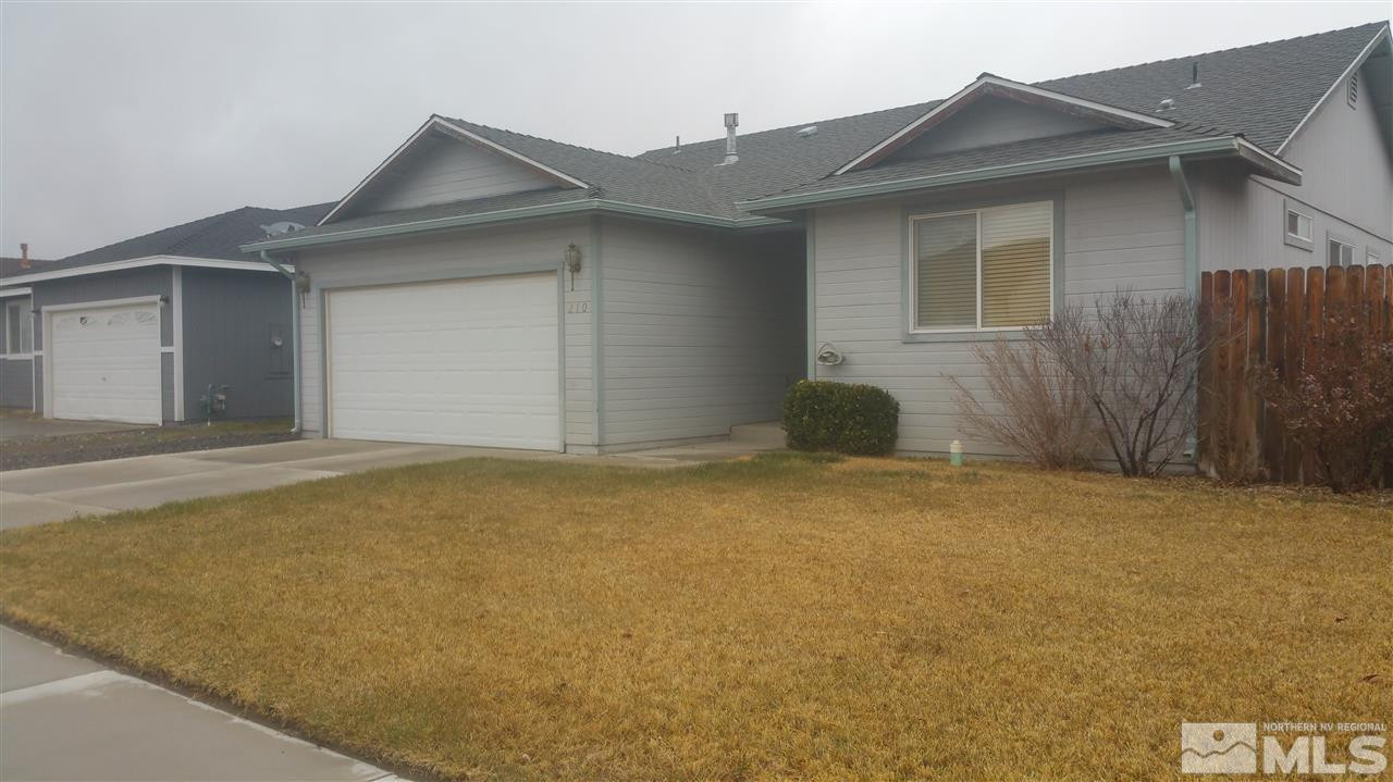 a house with trees in front of it