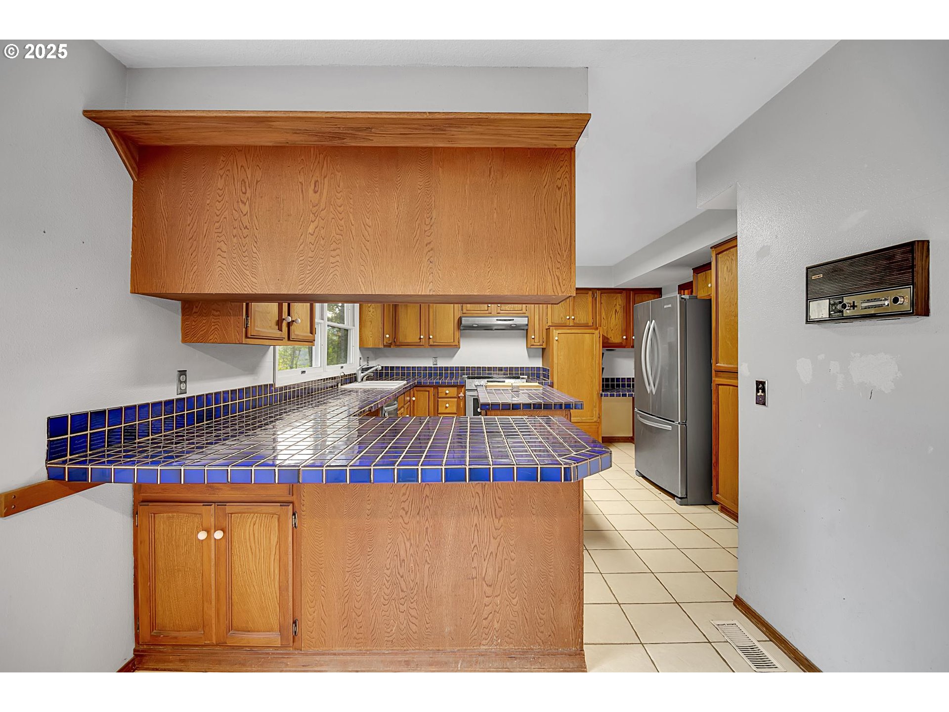 12077 Southeast Lusted Road Sandy, OR 97055 - Photo 37 of 44 a living room with a table and a walk in closet