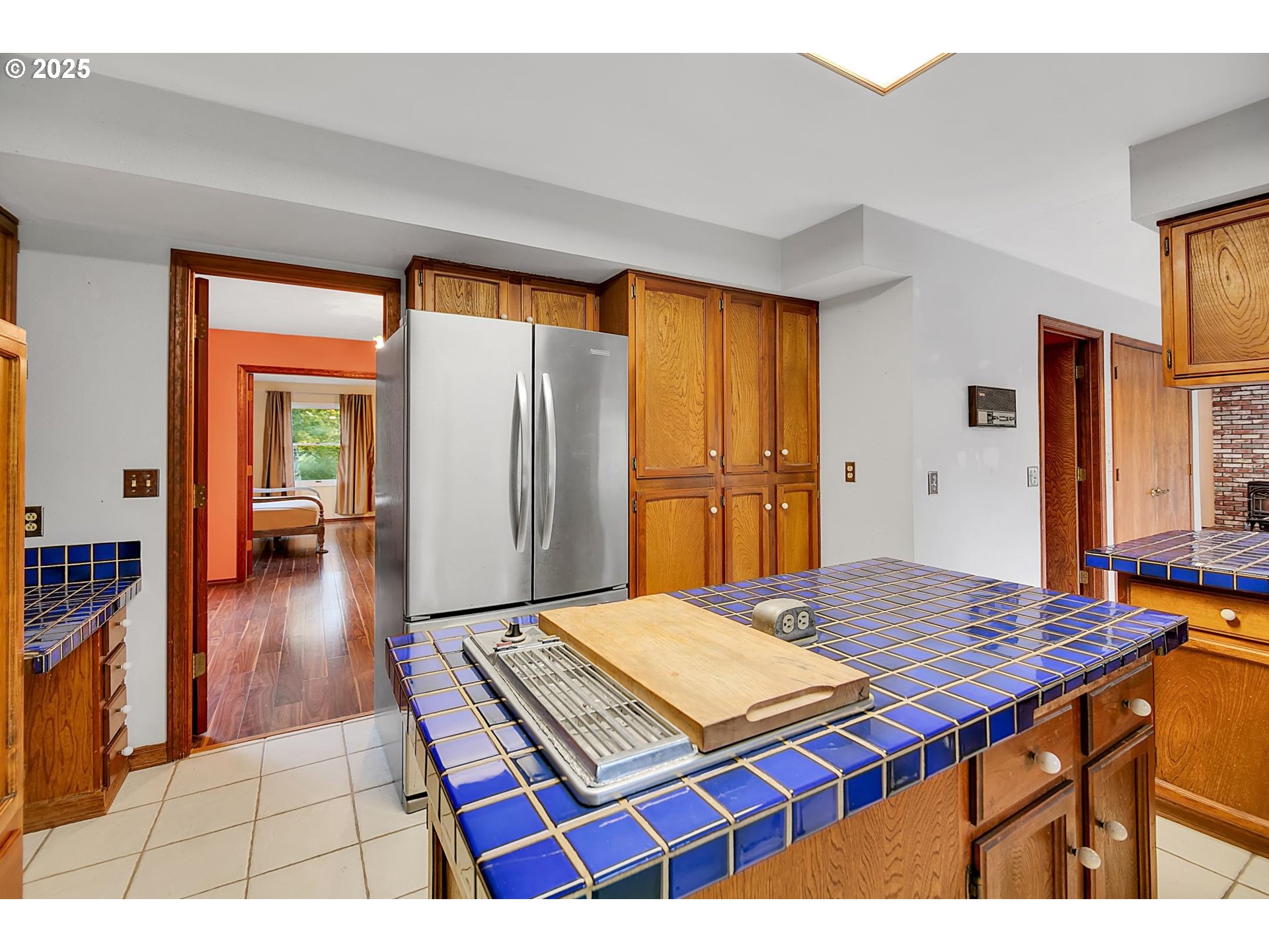 12077 Southeast Lusted Road Sandy, OR 97055 - Photo 42 of 44 a living room with a rug and wooden floor