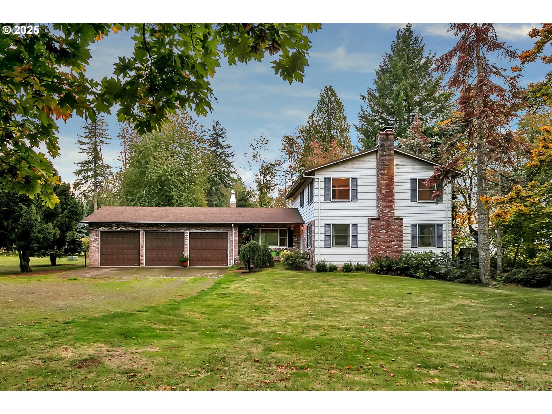 12077 Southeast Lusted Road Sandy, OR 97055 - Photo 6 of 44 a front view of a house with a garden