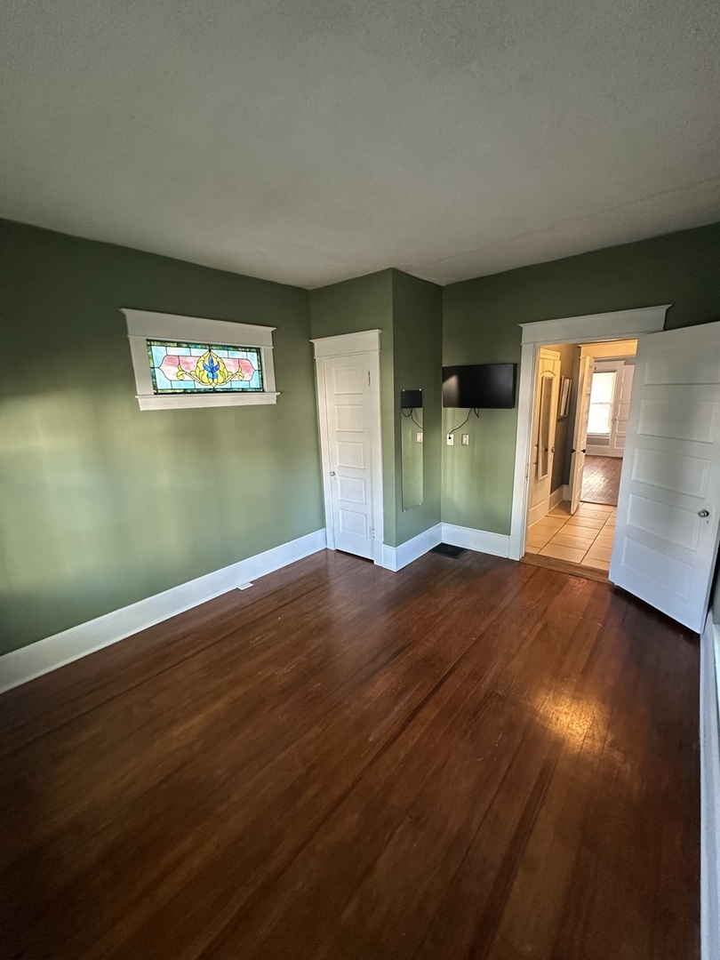 1307 South Main Street Bloomington, IL 61701 - Photo 31 of 48 a view of empty room with wooden floor