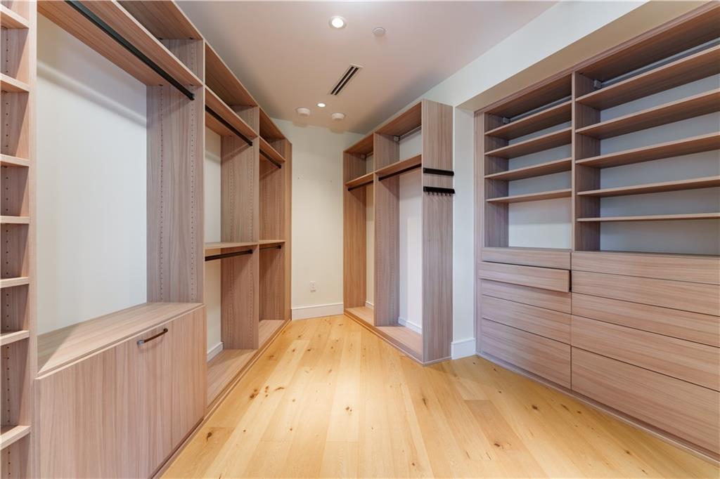 3376 Peachtree Road Northeast, Unit 34A Atlanta, GA 30326 - Photo 16 of 30 a view of walk in closet with empty racks