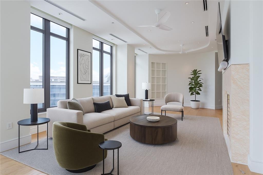 3376 Peachtree Road Northeast, Unit 34A Atlanta, GA 30326 - Photo 2 of 30 a living room with furniture and a large window