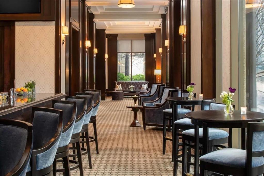 3376 Peachtree Road Northeast, Unit 34A Atlanta, GA 30326 - Photo 26 of 30 a view of a dining room with furniture and window