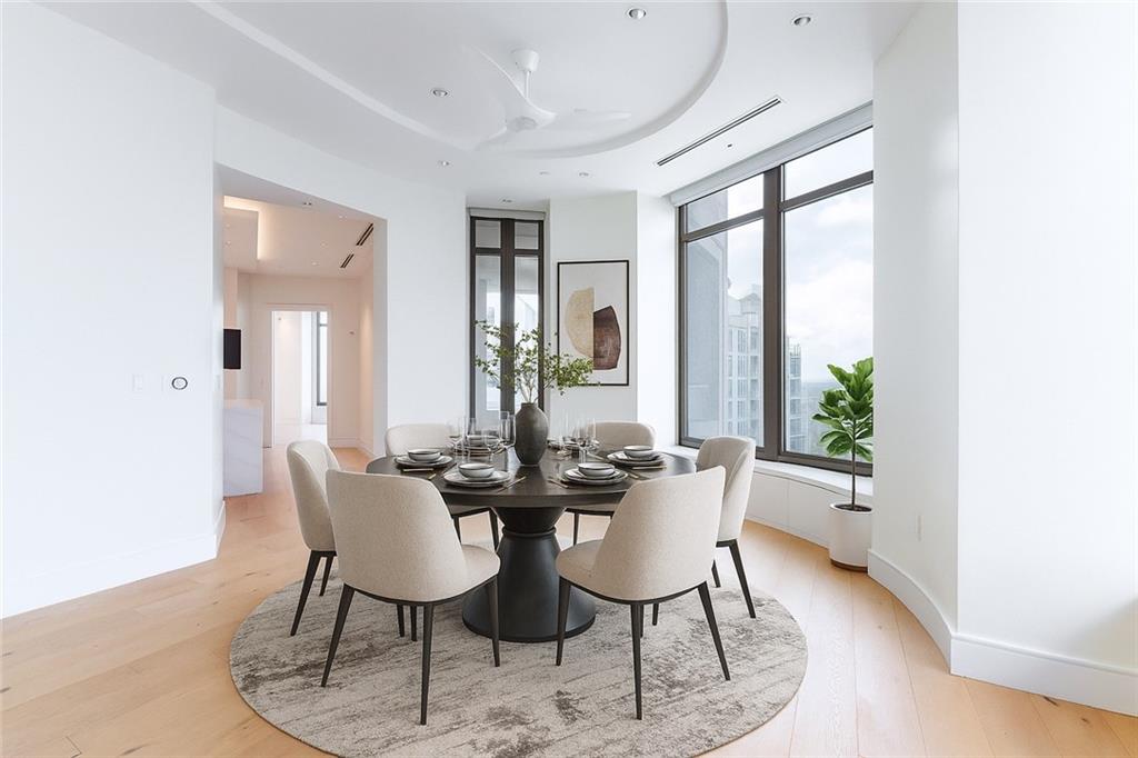 3376 Peachtree Road Northeast, Unit 34A Atlanta, GA 30326 - Photo 3 of 30 a view of a dining room with furniture and window