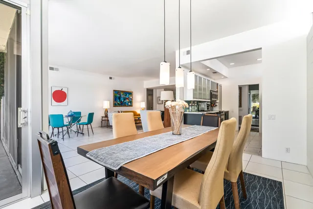 a kitchen with stainless steel appliances a stove top oven and a sink