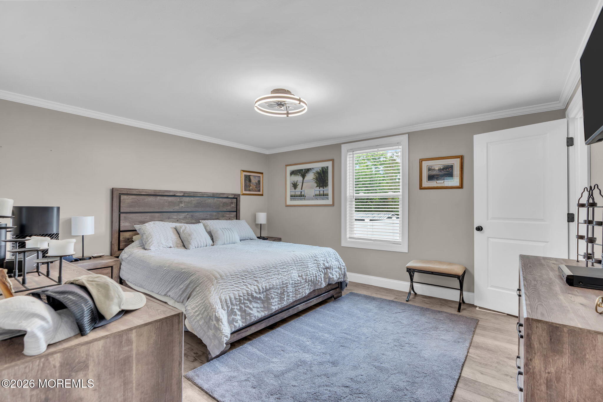 181 Locust Avenue Howell, NJ 07731 - Photo 28 of 66 a bedroom with a bed a couch and a window