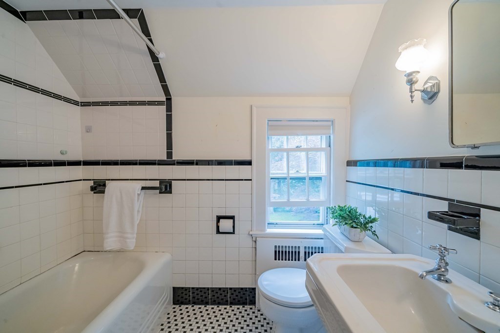 97 Blake Road Lexington, MA 02420 - Photo 39 of 42 a bathroom with a sink toilet and shower