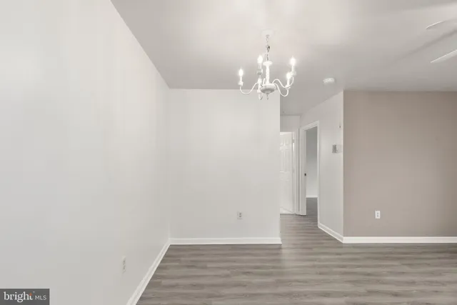 a view of a chandelier in hallway