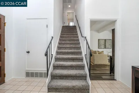 a bathroom with a shower and toilet