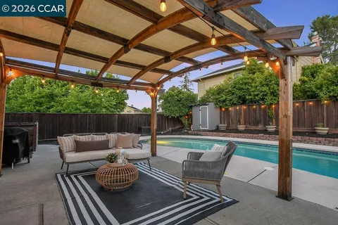 a view of a house with swimming pool