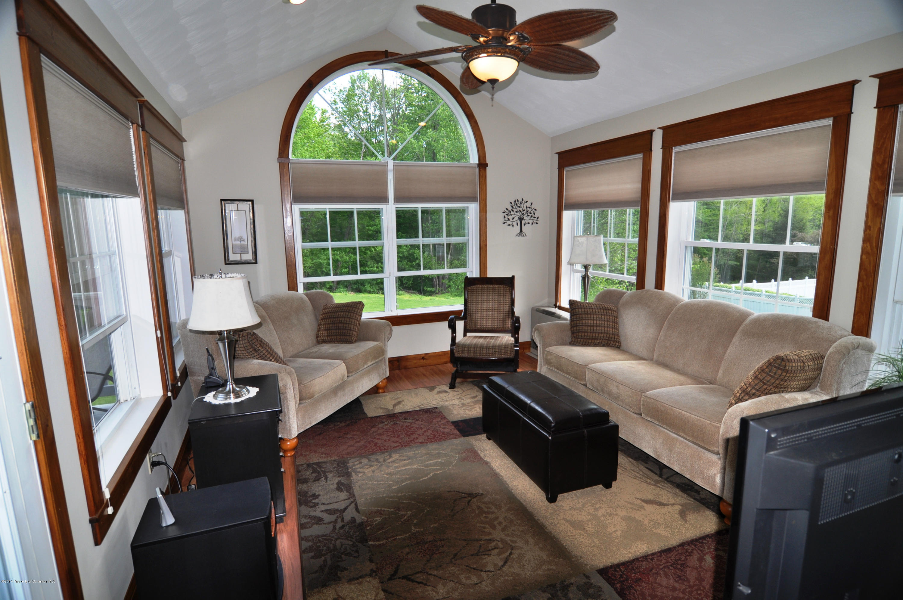 116 Griffin Road Moscow, PA 18444 - Photo 16 of 50 a living room with furniture and a large window