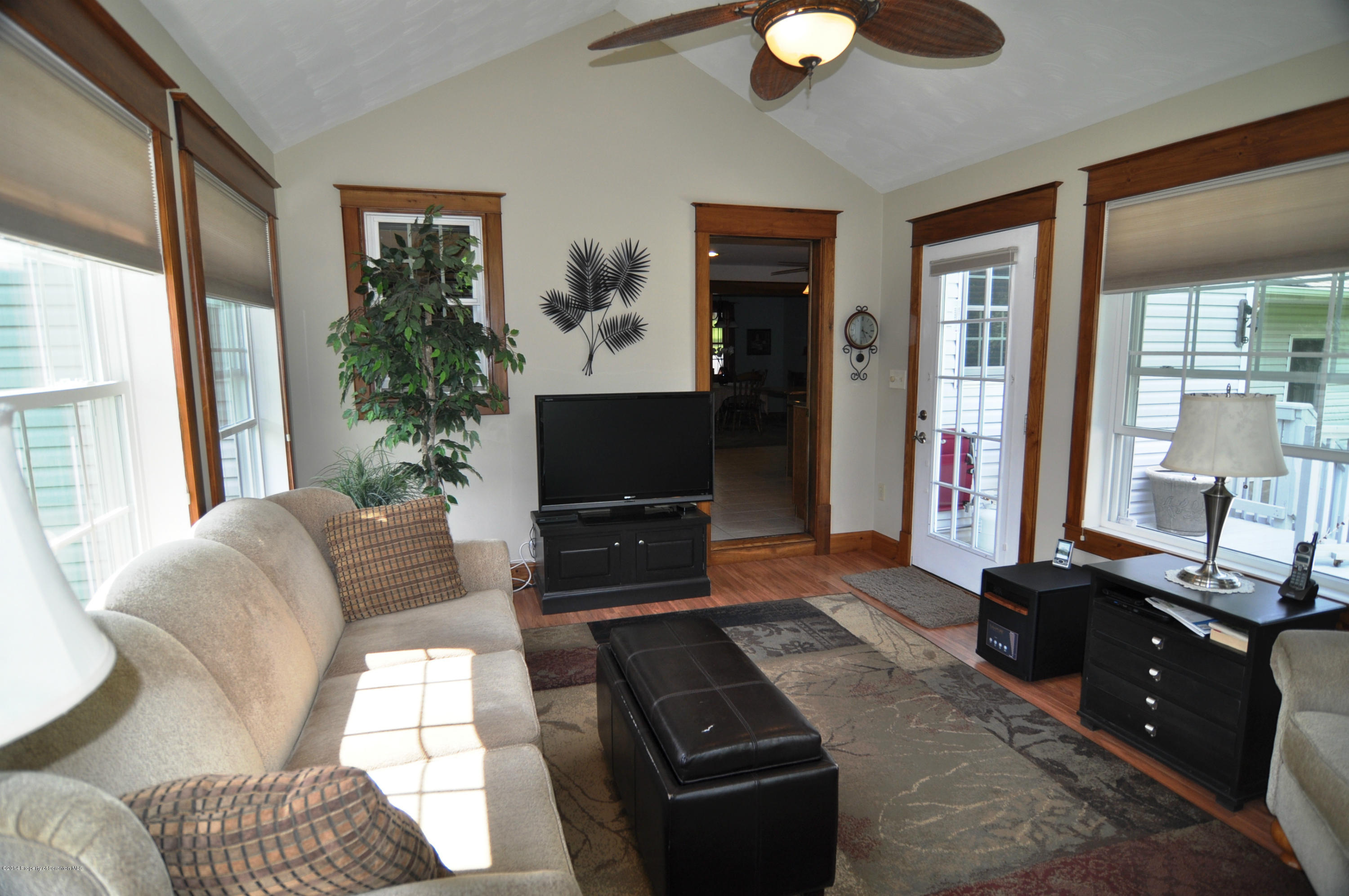 116 Griffin Road Moscow, PA 18444 - Photo 18 of 50 a living room with furniture and a flat screen tv