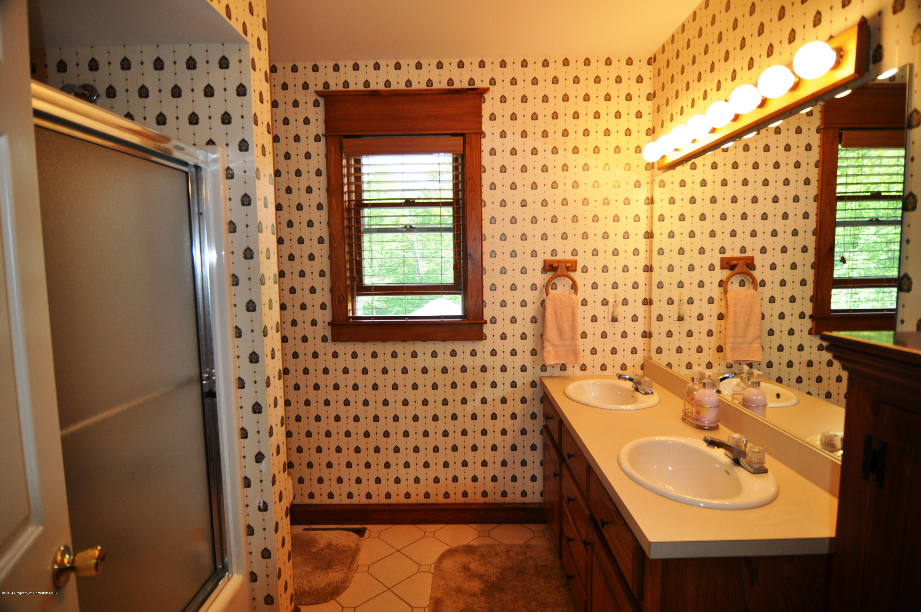 116 Griffin Road Moscow, PA 18444 - Photo 31 of 50 a bathroom with a sink toilet and shower
