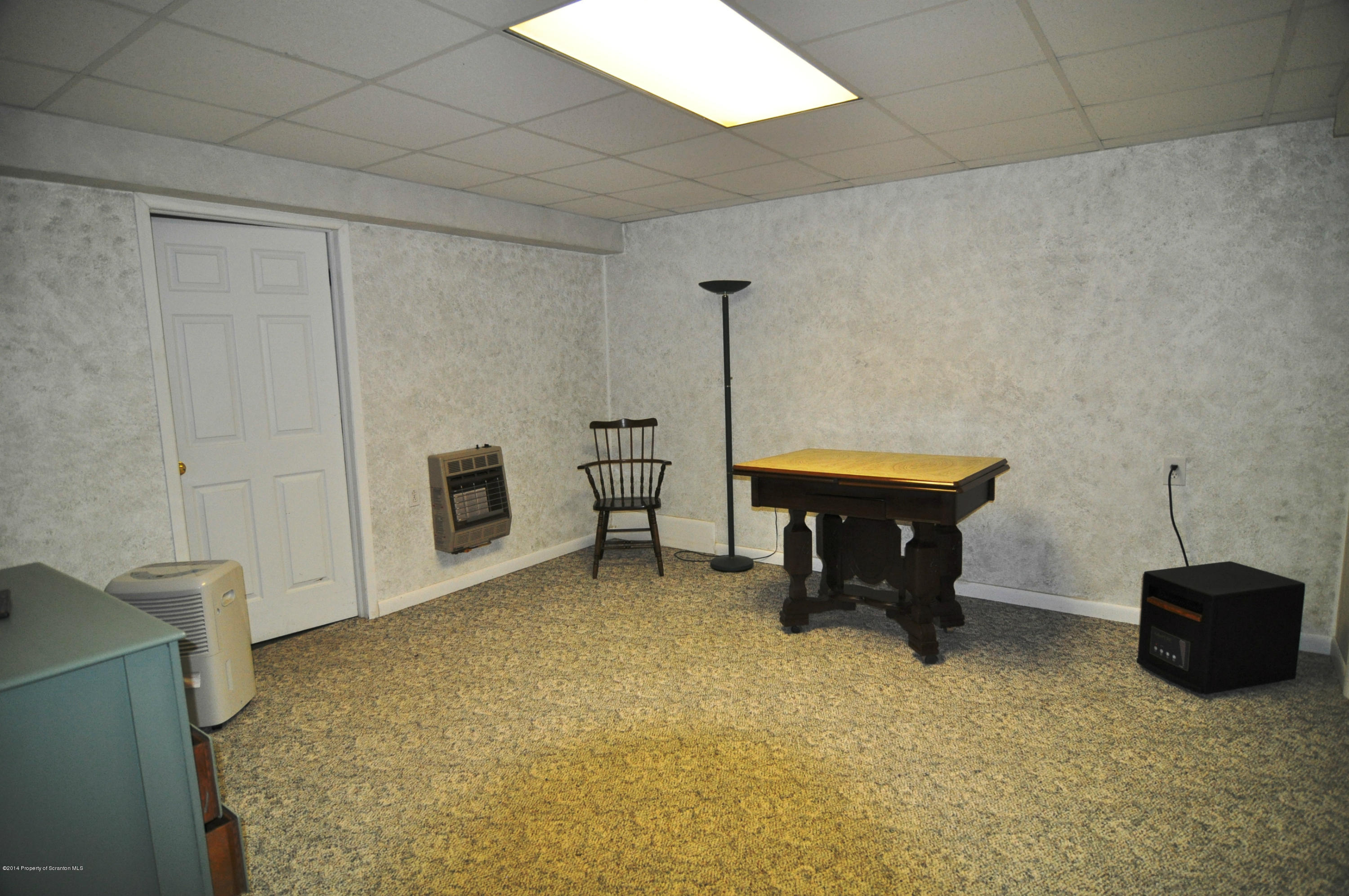 116 Griffin Road Moscow, PA 18444 - Photo 37 of 50 a room with a table and chairs