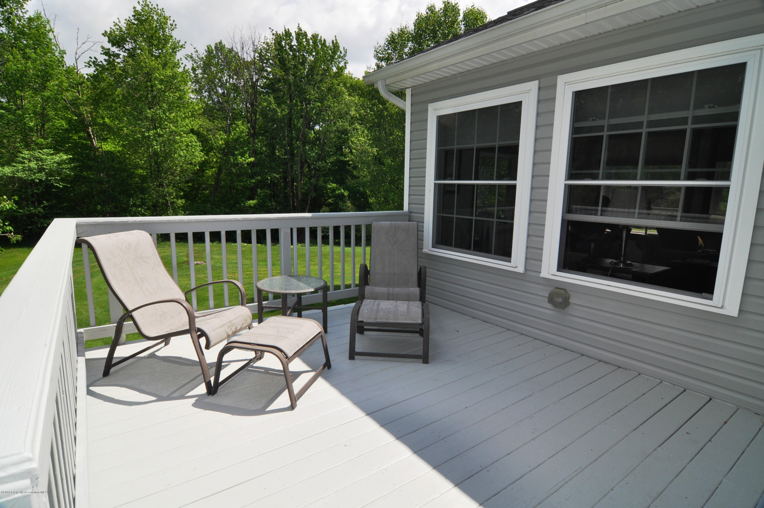 116 Griffin Road Moscow, PA 18444 - Photo 43 of 50 a view of a chair and table in the balcony