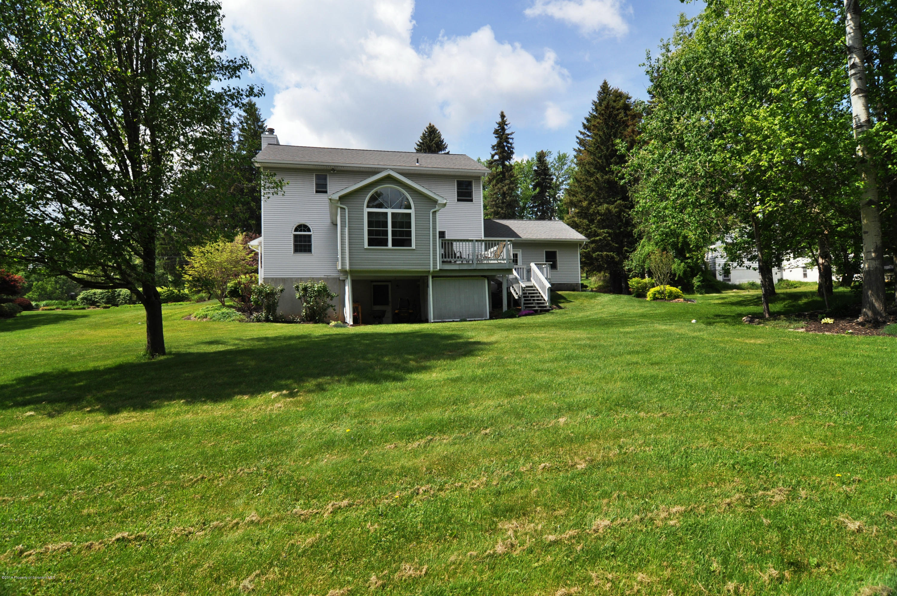 116 Griffin Road Moscow, PA 18444 - Photo 47 of 50 a front view of a house with a yard