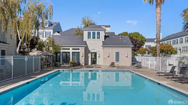 a front view of a house with swimming pool