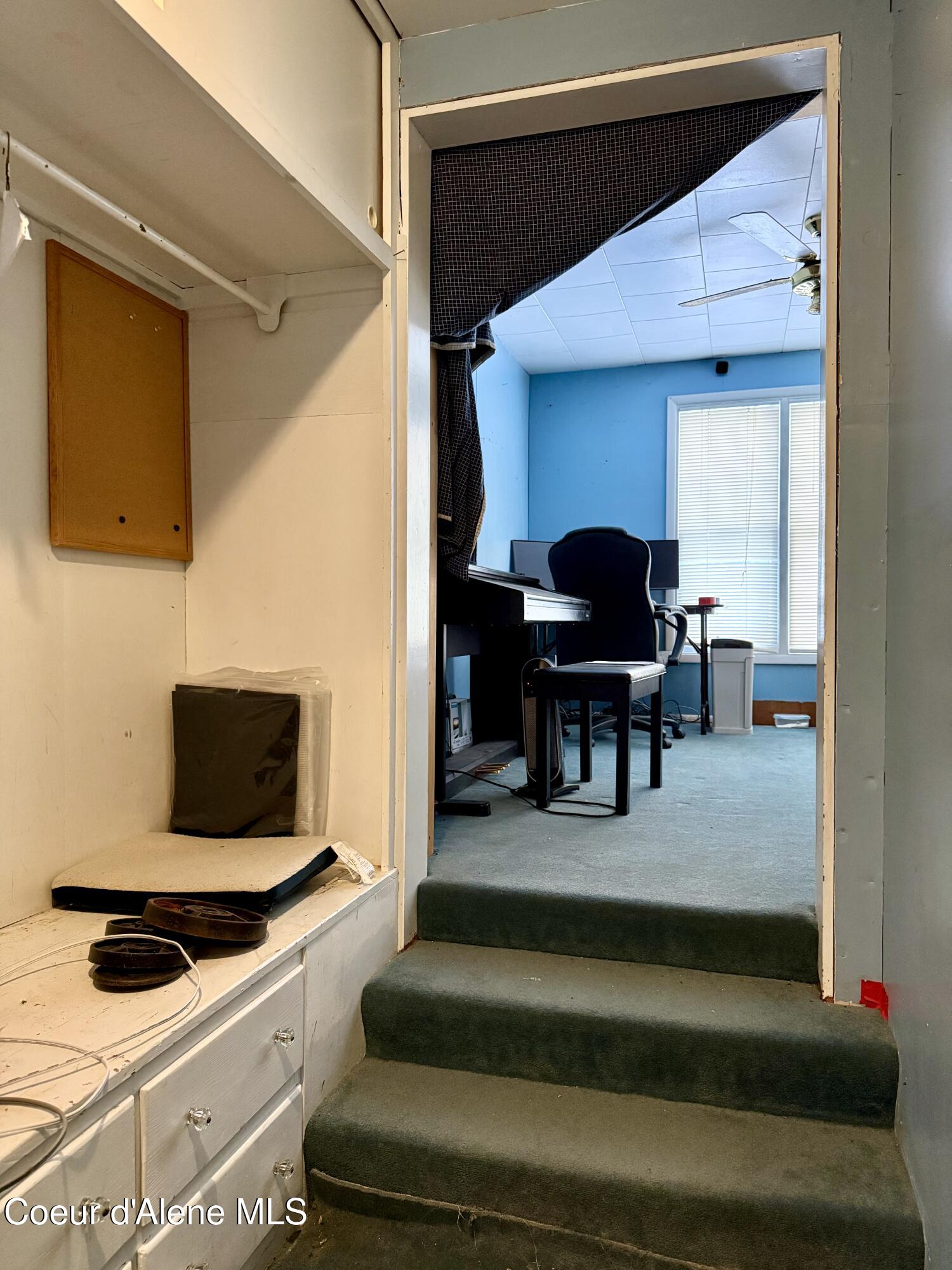 910 Main Street Wardner, ID 83837 - Photo 23 of 53 To Main Floor Bedroom 2