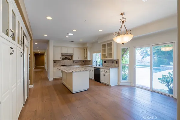 a view of room with window chandelier