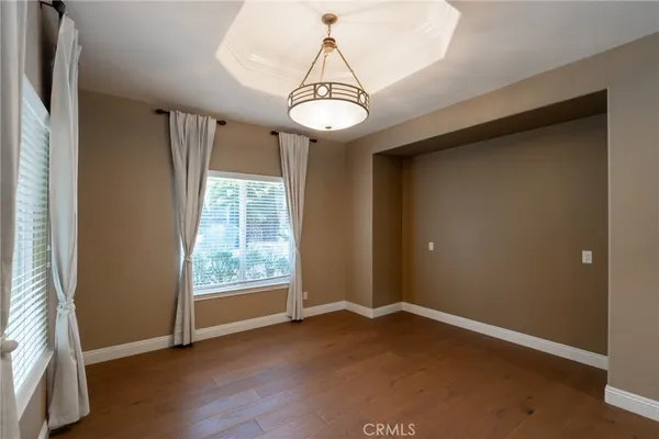 a bathroom with a glass door shower and a sink