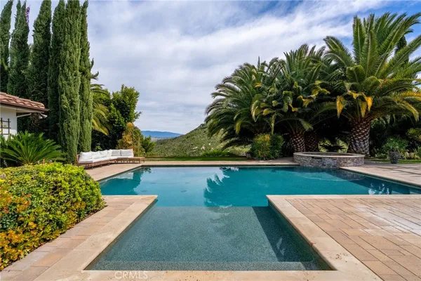 a view of a house with a swimming pool