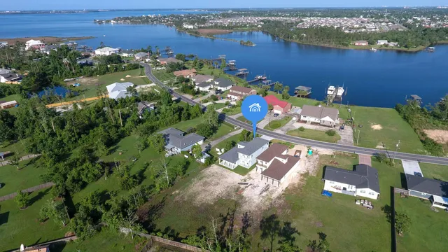 an aerial view of a house with a garden