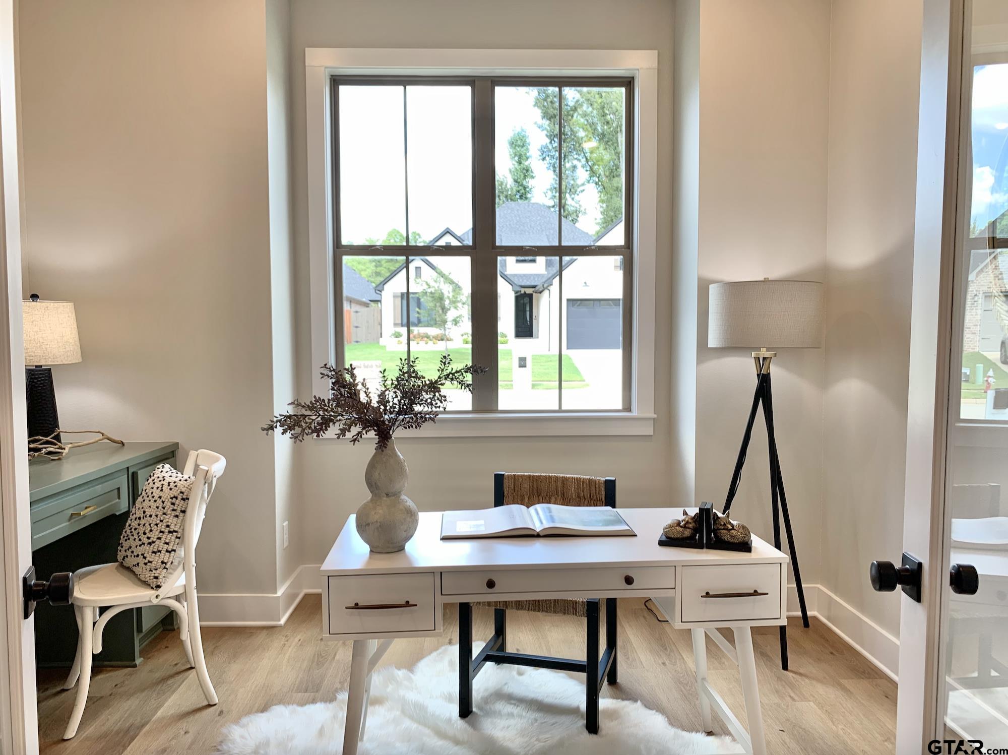 9115 Long Branch Tyler, TX 75703 - Photo 22 of 39 a view of a workspace with furniture and a window