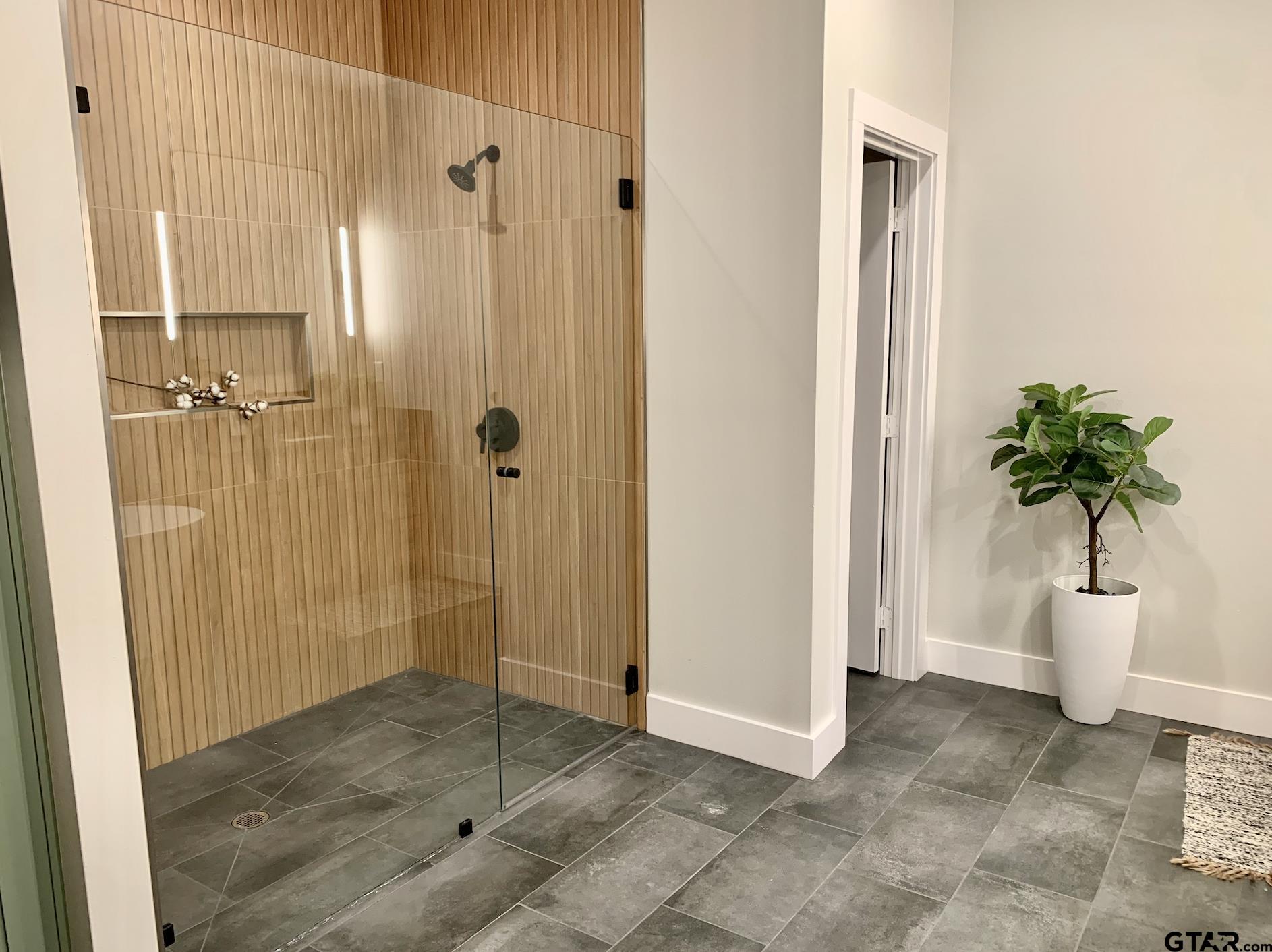 9115 Long Branch Tyler, TX 75703 - Photo 30 of 39 a view of a bathroom with a shower