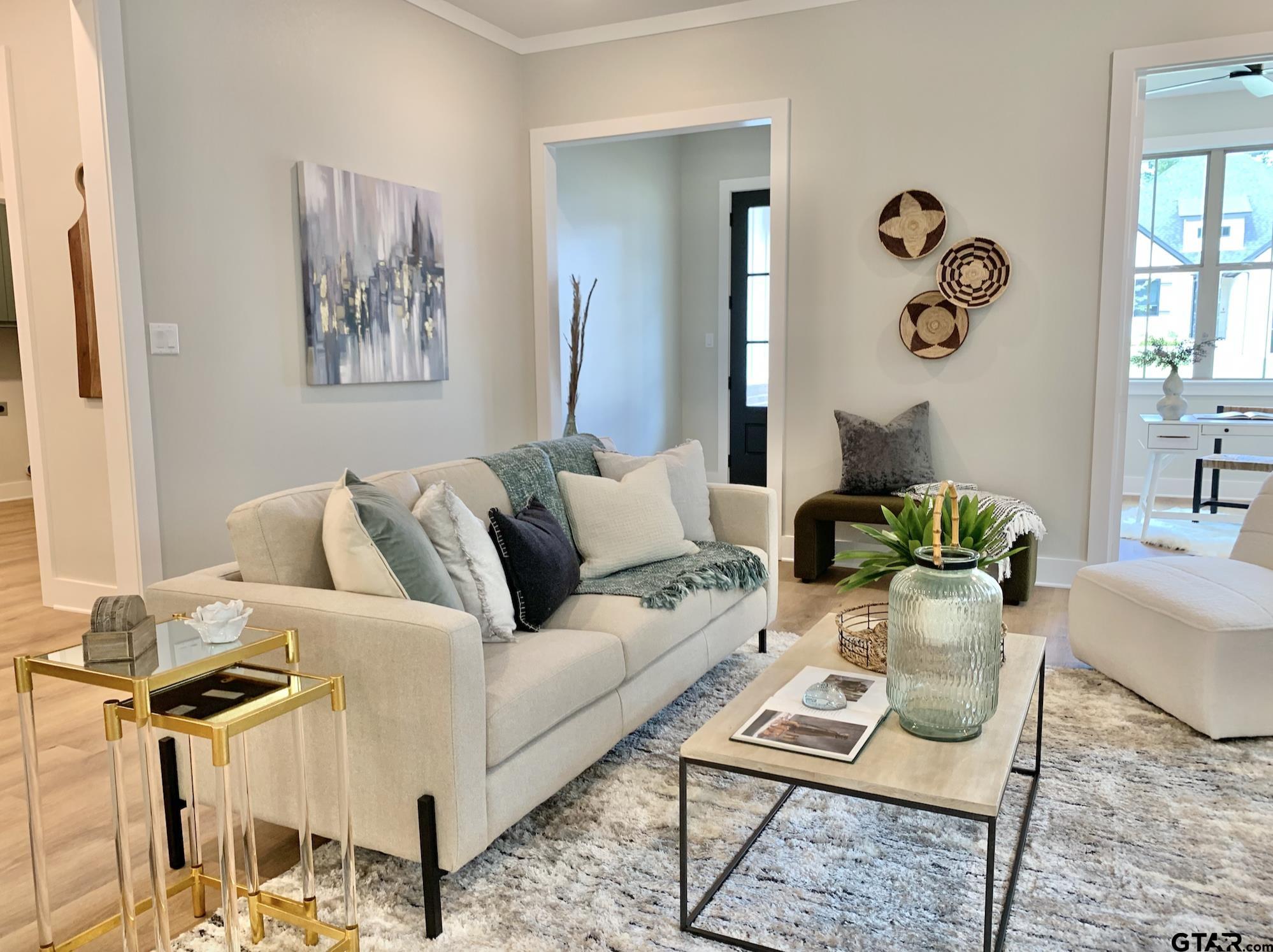 9115 Long Branch Tyler, TX 75703 - Photo 3 of 39 a living room with furniture and wooden floor