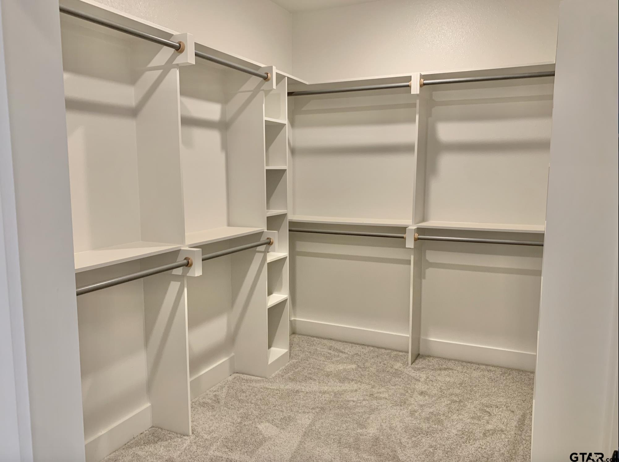 9115 Long Branch Tyler, TX 75703 - Photo 32 of 39 a view of an empty walk in closet
