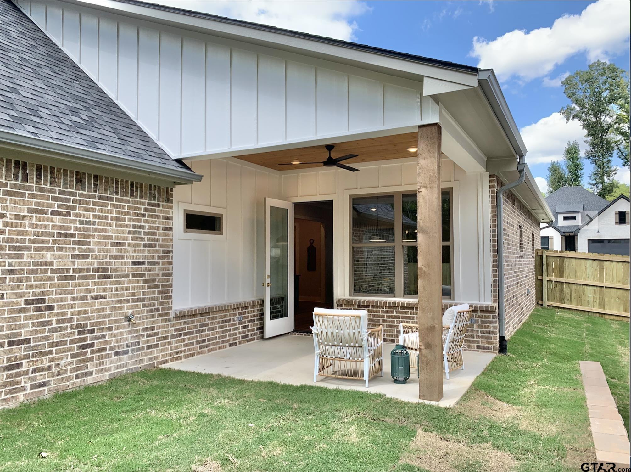 9115 Long Branch Tyler, TX 75703 - Photo 38 of 39 a front view of a house with a yard