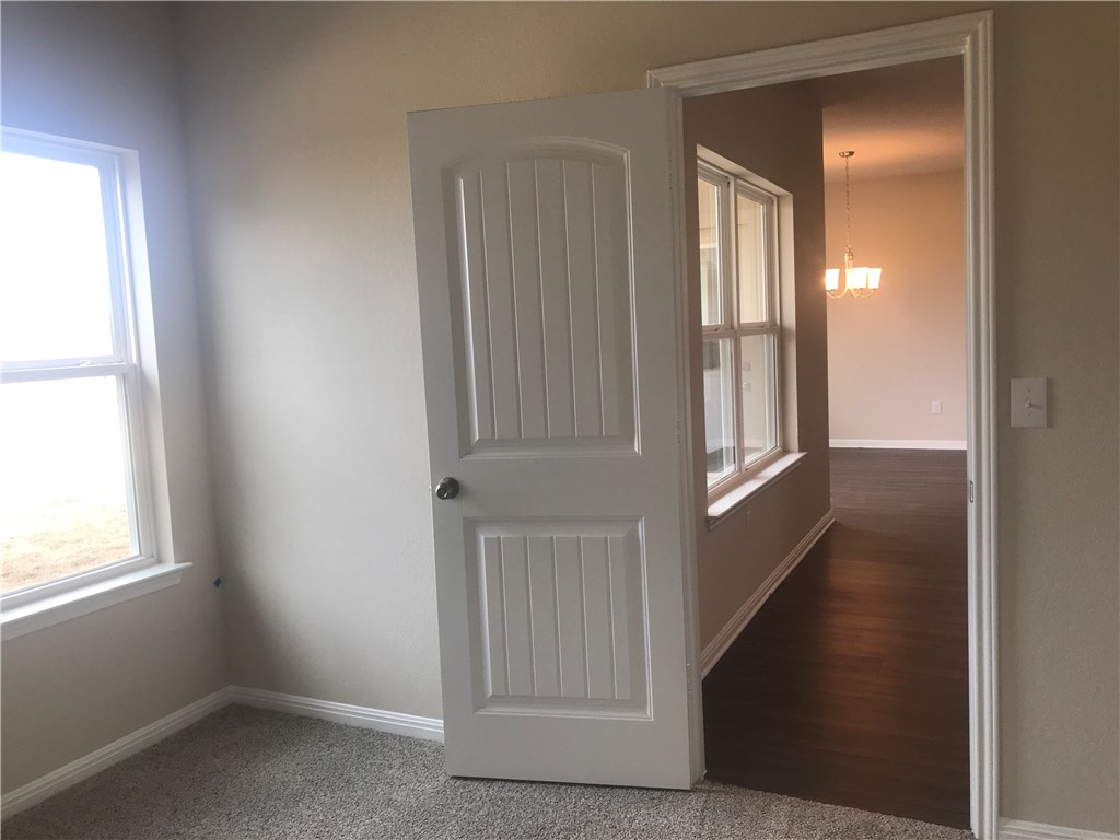 4313 Buffalo Ford Road Georgetown, TX 78628 - Photo 13 of 36 an entryway with a glass door
