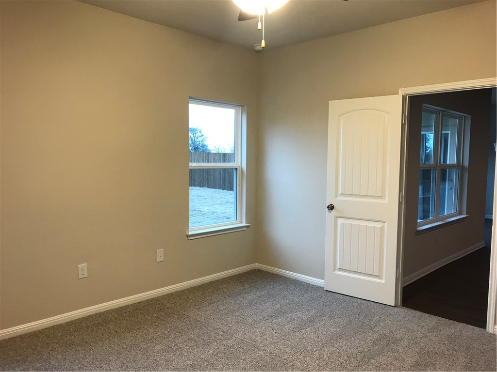 4313 Buffalo Ford Road Georgetown, TX 78628 - Photo 23 of 36 an empty room with windows