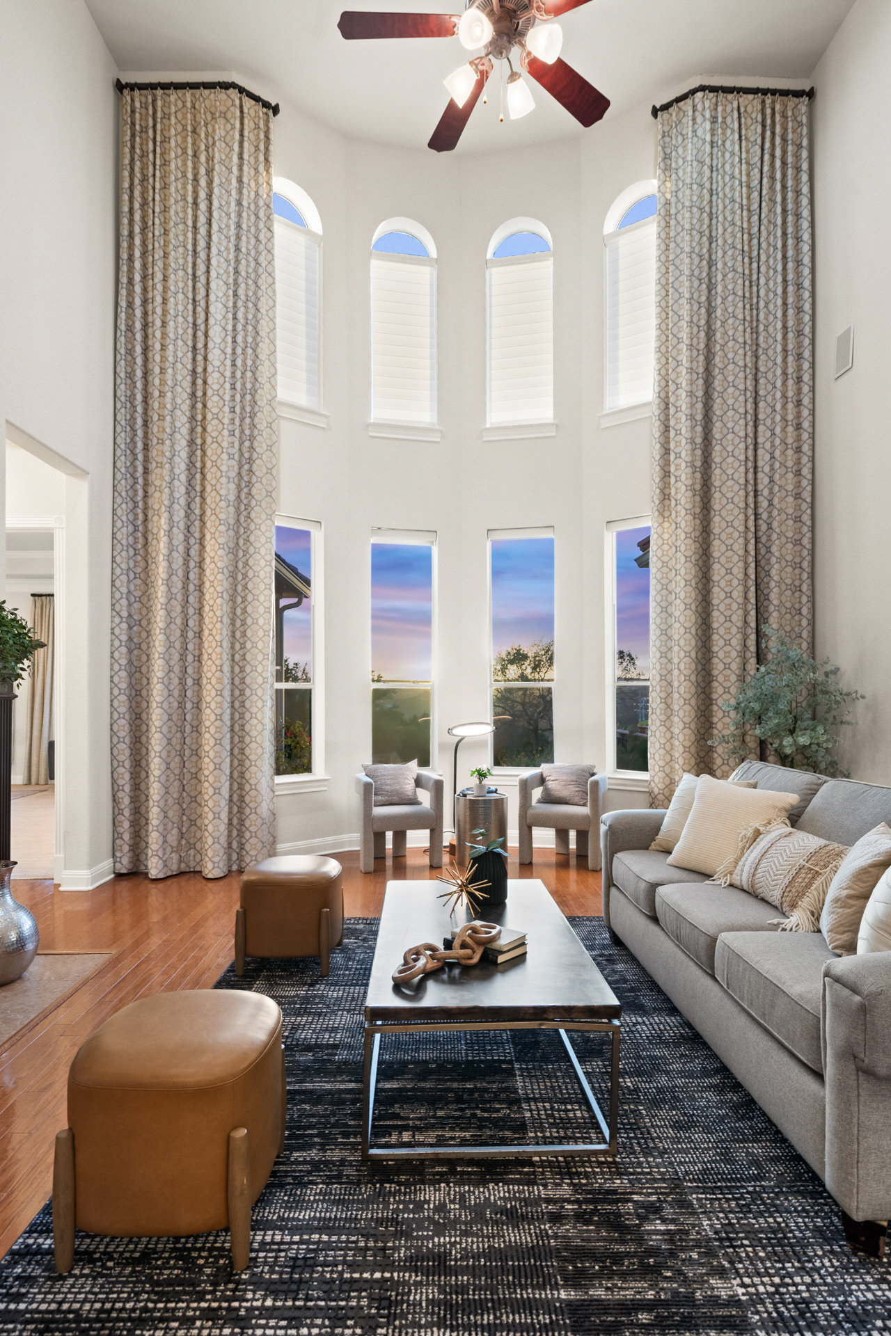 2906 Lakehurst Road Spicewood, TX 78669 - Photo 14 of 40 a living room with furniture and a large window