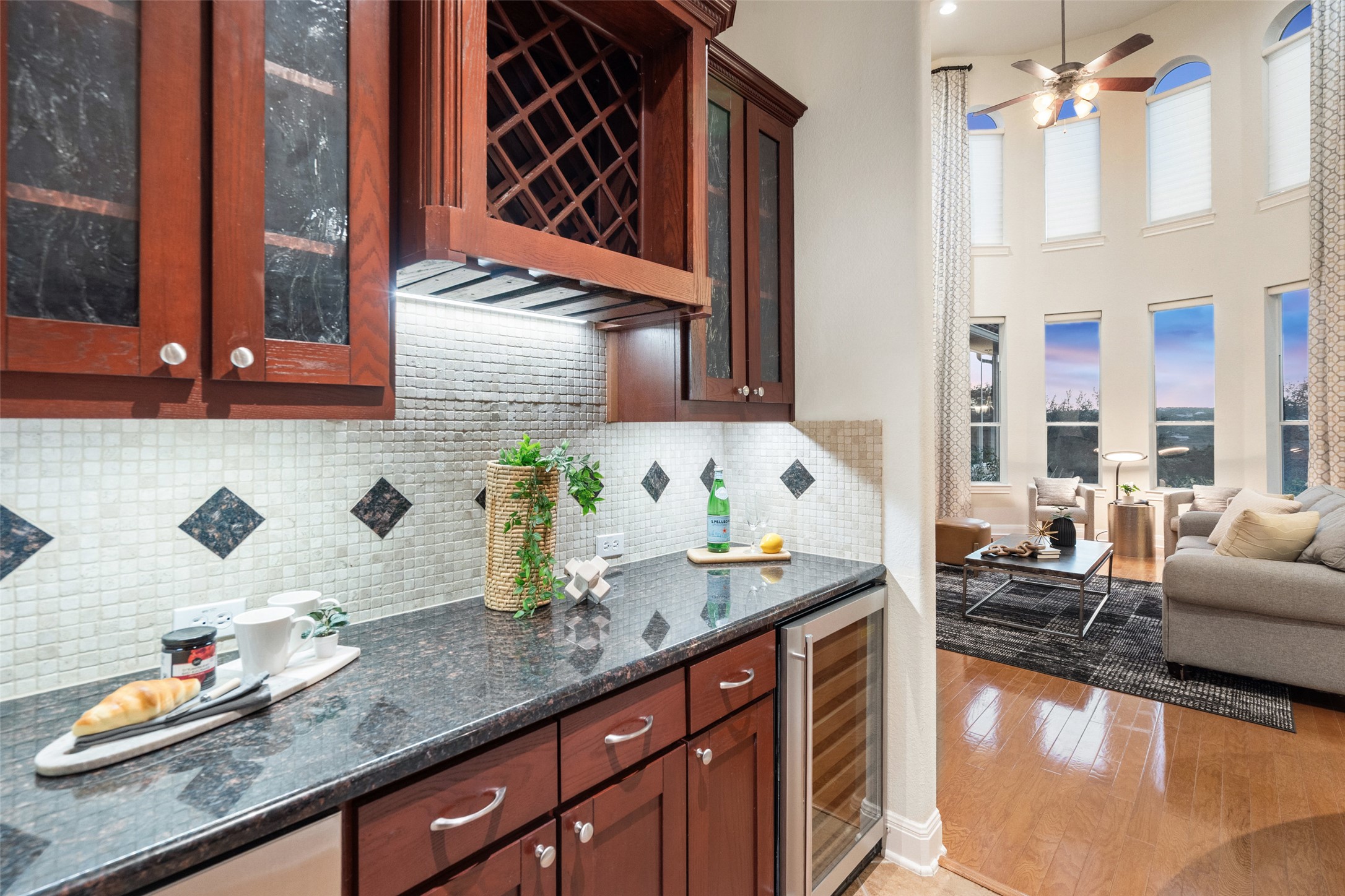 2906 Lakehurst Road Spicewood, TX 78669 - Photo 20 of 40 a bathroom with a granite countertop sink and a large mirror